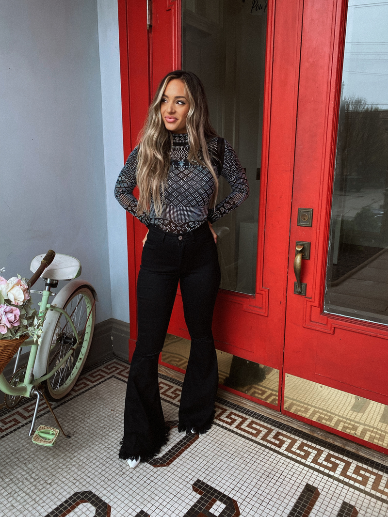 Distressed High Waisted Flare Stretch Jeans