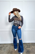 Medium Wash Denim Distressed High Waisted Flares