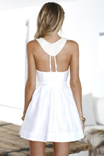 White Dress with Beaded Back Detail & Pleated Skirt