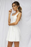 White Dress with Beaded Back Detail & Pleated Skirt
