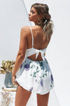 Secret wishes playsuit, white, floral, purple floral, green, cute playsuits, lace playsuit, mini playsuit, tie up playsuit, backless playsuit, trends, current trends, style, women's fashion, Kylie Jenner, festival outfits, casual outfits, summer playsuit
