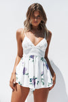 Secret wishes playsuit, white, floral, purple floral, green, cute playsuits, lace playsuit, mini playsuit, tie up playsuit, backless playsuit, trends, current trends, style, women's fashion, Kylie Jenner, festival outfits, casual outfits, summer playsuit